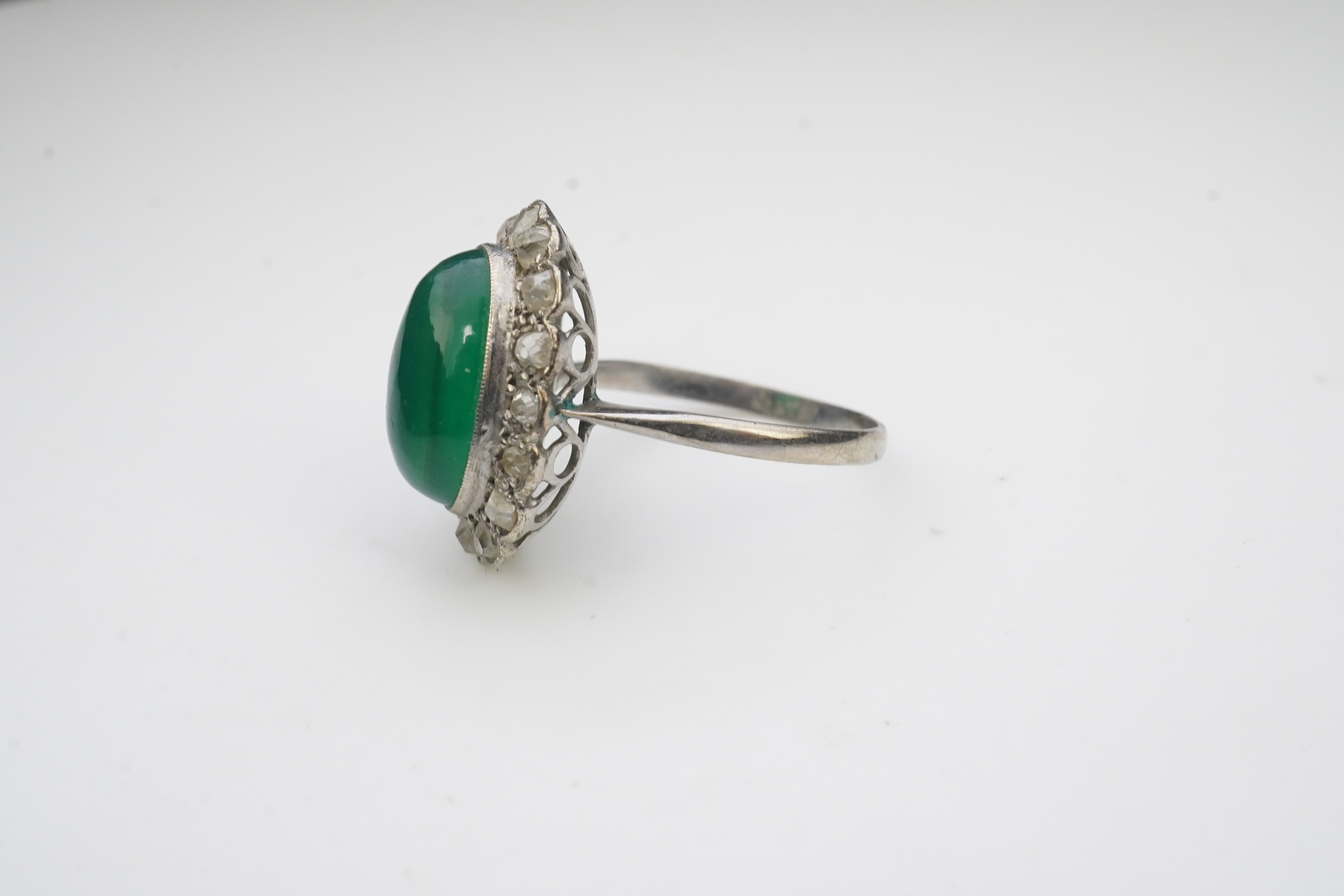 A green chalcedony and diamond ring, early 20th century